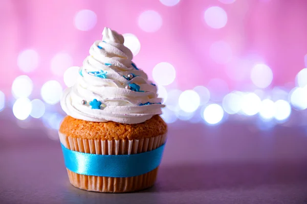 Cupcake with white cream icing — Stock Photo, Image
