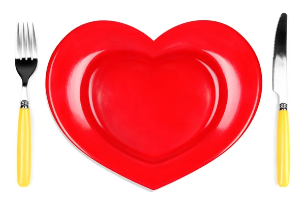 Plate in shape of heart isolated — Stock Photo, Image