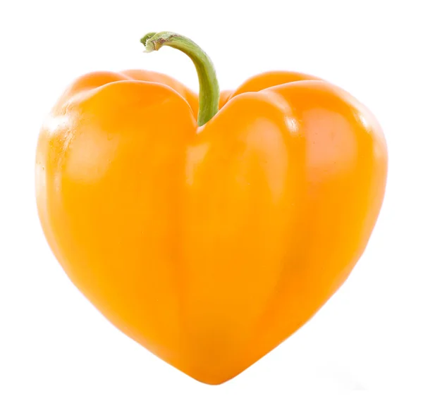 Yellow pepper in heart shape isolated on white — Stock Photo, Image