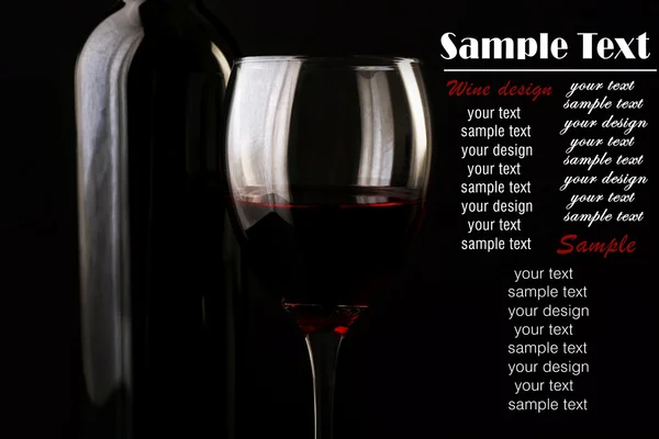 Red wine glass and bottle — Stock Photo, Image