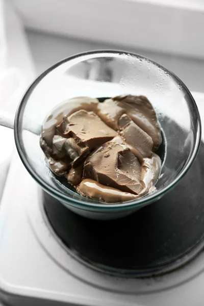 Melting chocolate on stove — Stock Photo, Image