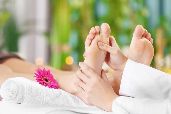 Woman relaxing with leg massage — Stock Photo, Image