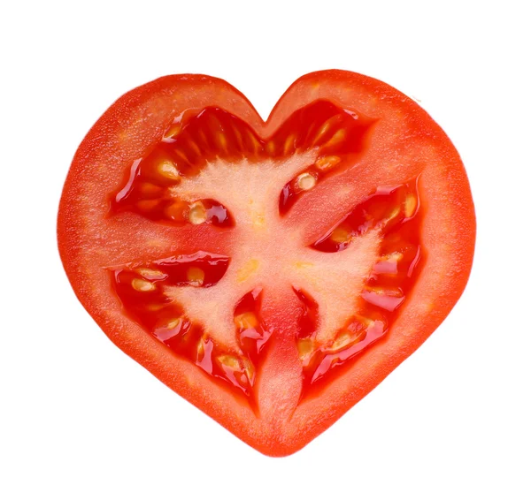 Slice of fresh tomato in heart shape, isolated on white Stock Photo