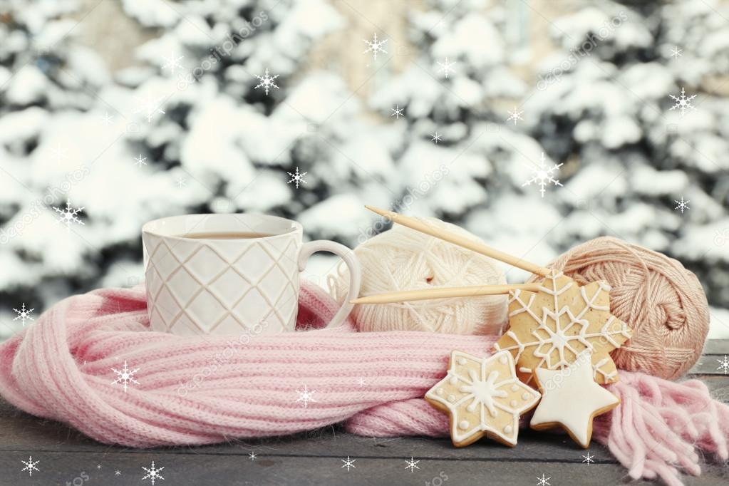 Cup of hot drink on windowsill