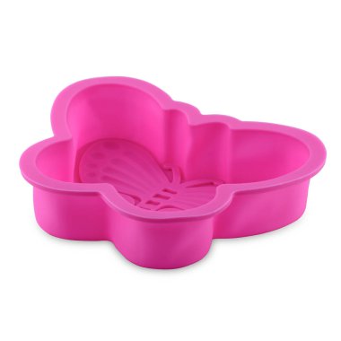 Beyaz arka planda izole edilmiş pembe silikon kek ya da kek formu. Kek kabı, silikon kalıbı, kek kalıbı..