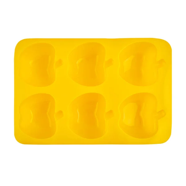黄色のシリコーンマフィンまたはカップケーキフォームは白い背景に隔離されています ケーキカップ シリコン型 ベーカリー トップビュー フラットレイアウト — ストック写真