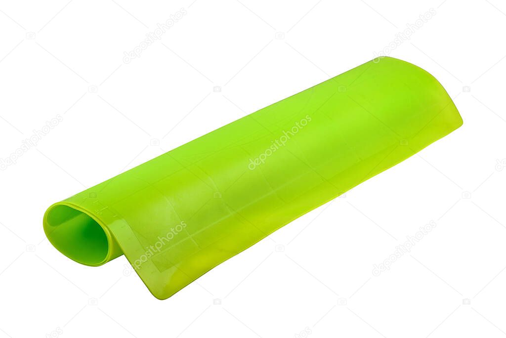 Green silicone baking mat isolated on white background, copy space. Clipping path