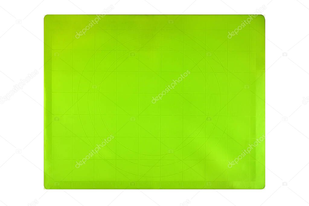 Green silicone baking mat isolated on white background, copy space. Top view, flat lay. Clipping path