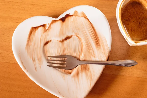 Closeup of cup of coffee and dirty saucer plate. — Stock Photo, Image