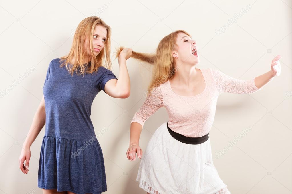 Aggressive mad women fighting each other.