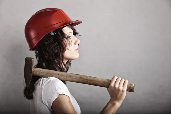 Sexy girl in safety helmet holding hammer tool — Stock Photo, Image