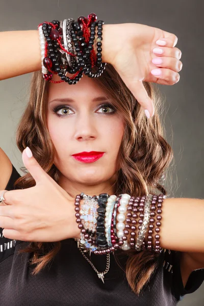 Woman with jewellery in black evening dress — Stock Photo, Image