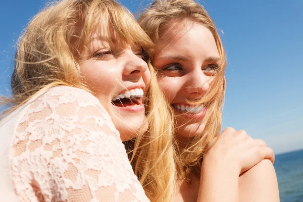 Two women best friends having fun outdoor Stock Picture