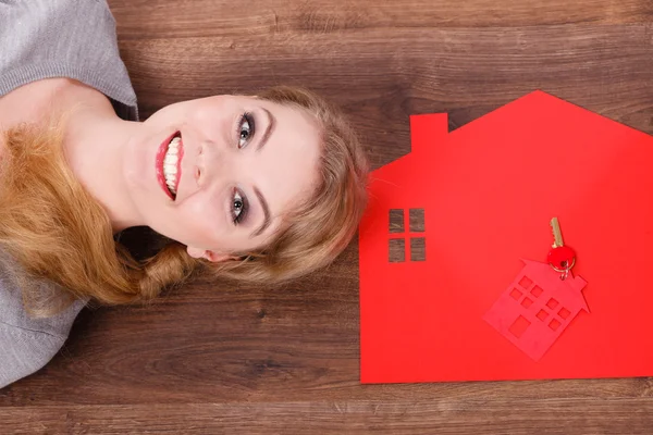 Young lady on floor with home. — Stock Photo, Image