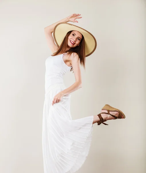 Woman in straw hat and white dress — Stock Photo, Image