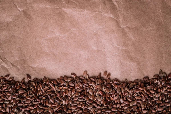 Moldura de borda de linhaça de sementes de linho cru marrom — Fotografia de Stock
