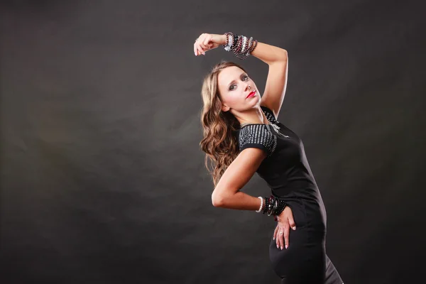 Woman with jewellery in black evening dress — Stock Photo, Image