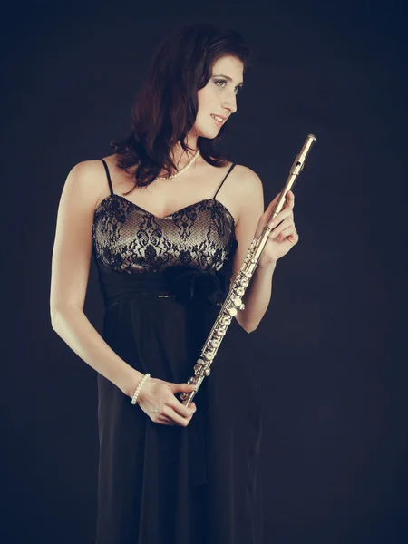 Elegant woman with flute instrument. — Stock Photo, Image