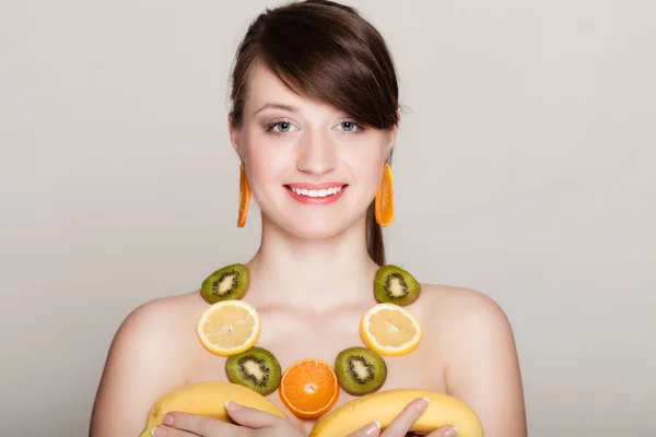 Diet. Girl with necklace of fresh citrus fruits — Stock Photo, Image