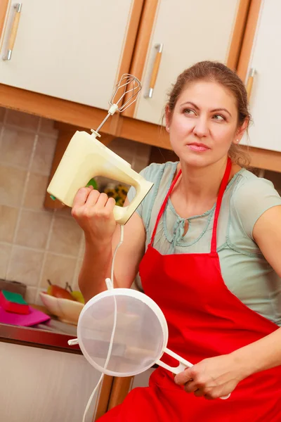 Housewife with mixer having fun in kitchen. — Stock Photo, Image