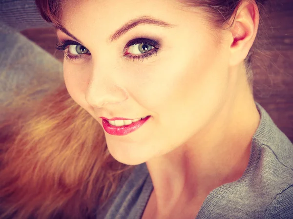 Young cheerful lady lying on floor. — Stock Photo, Image