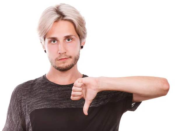 Male student giving thumb down — Stock Photo, Image