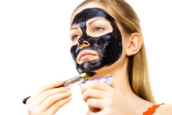 Young Woman Applying Brush Black Detox Mud Mask Her Face — Stock Photo, Image