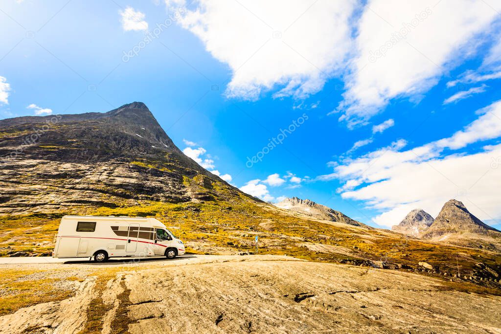 Camper car in mountains on roadside. Camping on trip. Norway Scandinavia Europe.