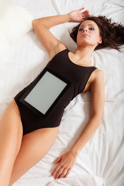 Girl lying with tablet — Stock Photo, Image