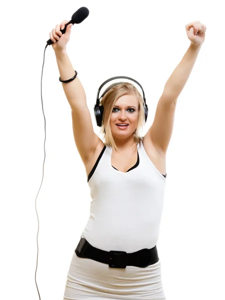 Girl singer wearing headphones — Stock Photo, Image