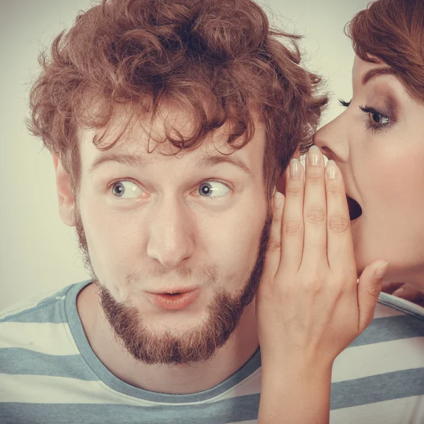 Woman telling to man some secrets — Stock Photo, Image