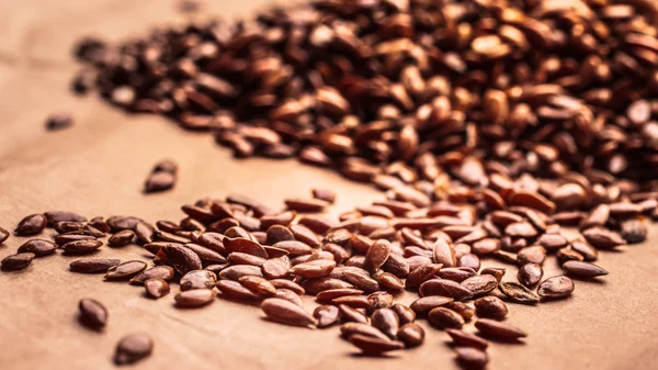 Heap of flax seeds linseed closeup — Stock Photo, Image