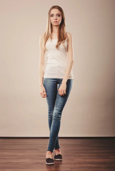 Girl full length in denim trousers white blank — Stok fotoğraf