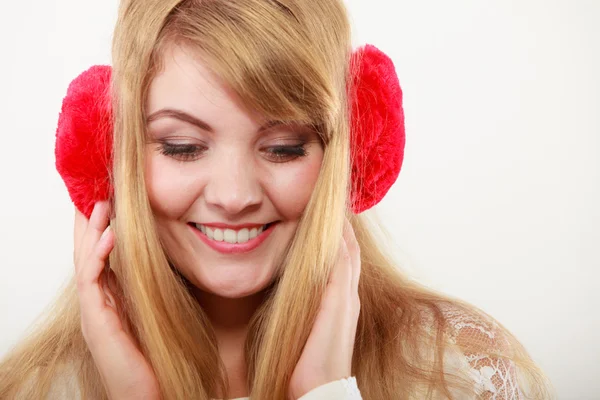 Happy fashionable girl in red earmuffs — 图库照片