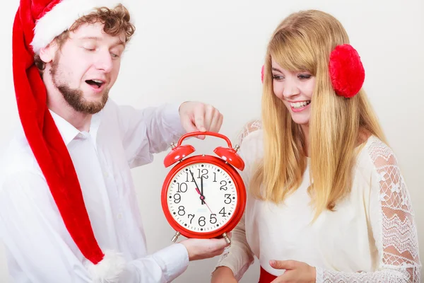 Happy couple woman and man with alarm clock. — Stock Photo, Image