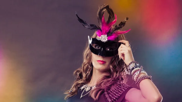 Woman with carnival venetian mask on dark — Stock Photo, Image