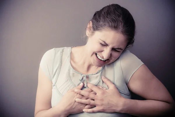 Frau empfindet Schmerzen — Stockfoto