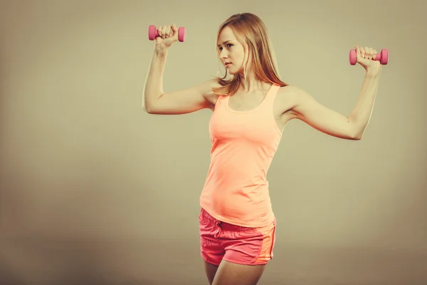 Fitness woman exercising with dumbbells. — Stock Photo, Image