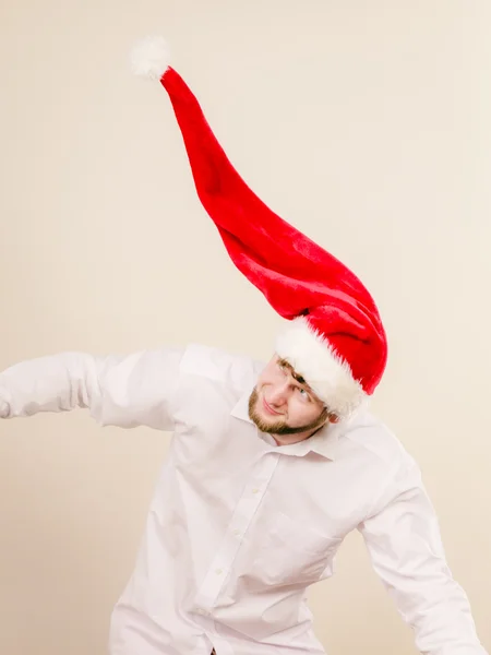 Homem ativo em santa hat dançando . — Fotografia de Stock