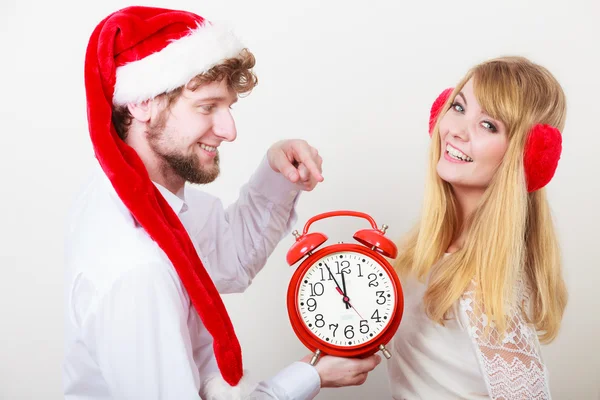 Happy couple woman and man with alarm clock. — Stock Photo, Image