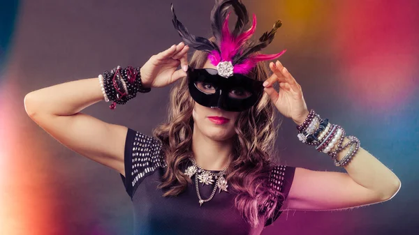 Woman with carnival venetian mask on dark — Stock Photo, Image