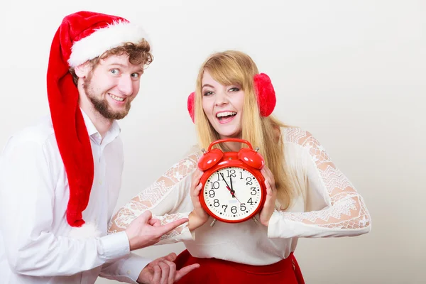 Happy couple woman and man with alarm clock. — Stock Photo, Image