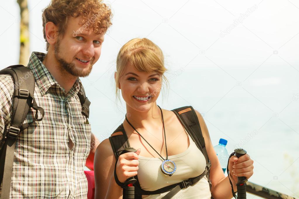 Backpackers couple on summer vacation trip