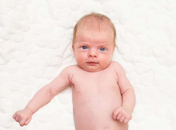 Newborn baby portrait with funny face expression — Stock Photo, Image