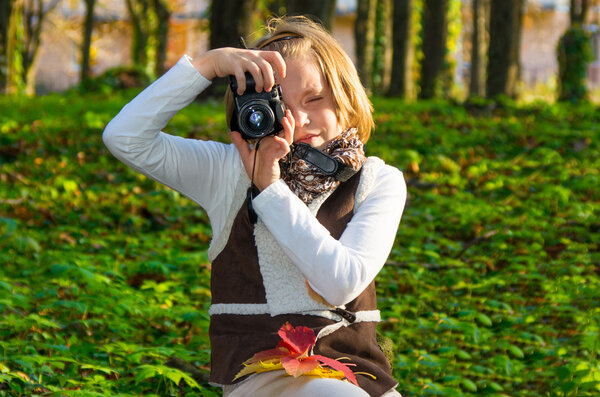 Little girl with camera 