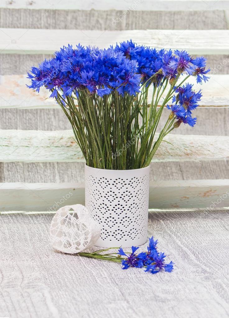 composition a bouquet of flowers of blue cornflowers