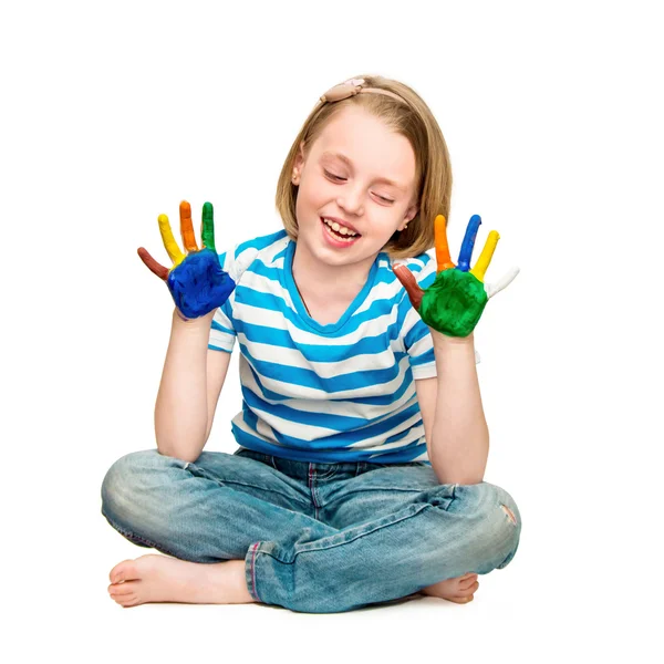 Linda menina feliz com as mãos na pintura . — Fotografia de Stock