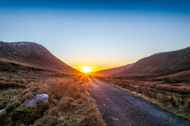 Winter sunset at the Glenveagh National Park in County Donegal - Ireland clipart