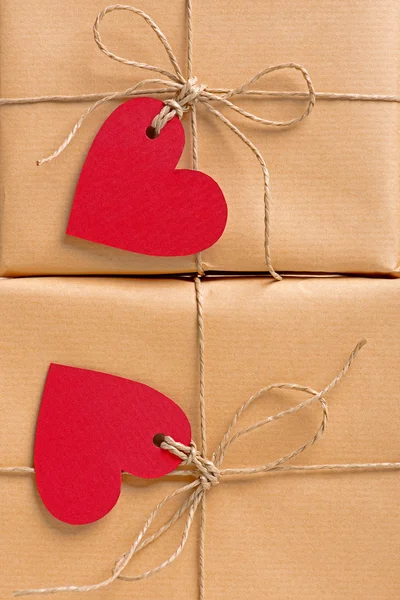 Gift boxes heart-shaped labels — Stock Photo, Image