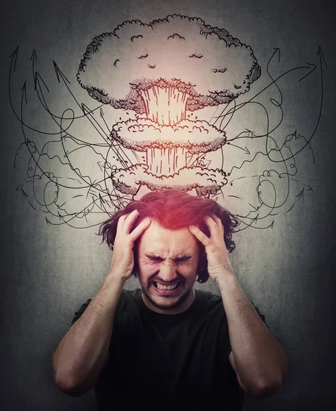 Head explosion metaphor. Bewildered man messing up and pulling his hair,  eyes closed screaming and clenching teeth. Suffering headache, dementia disease. Mental health concept, migraine and anxiety